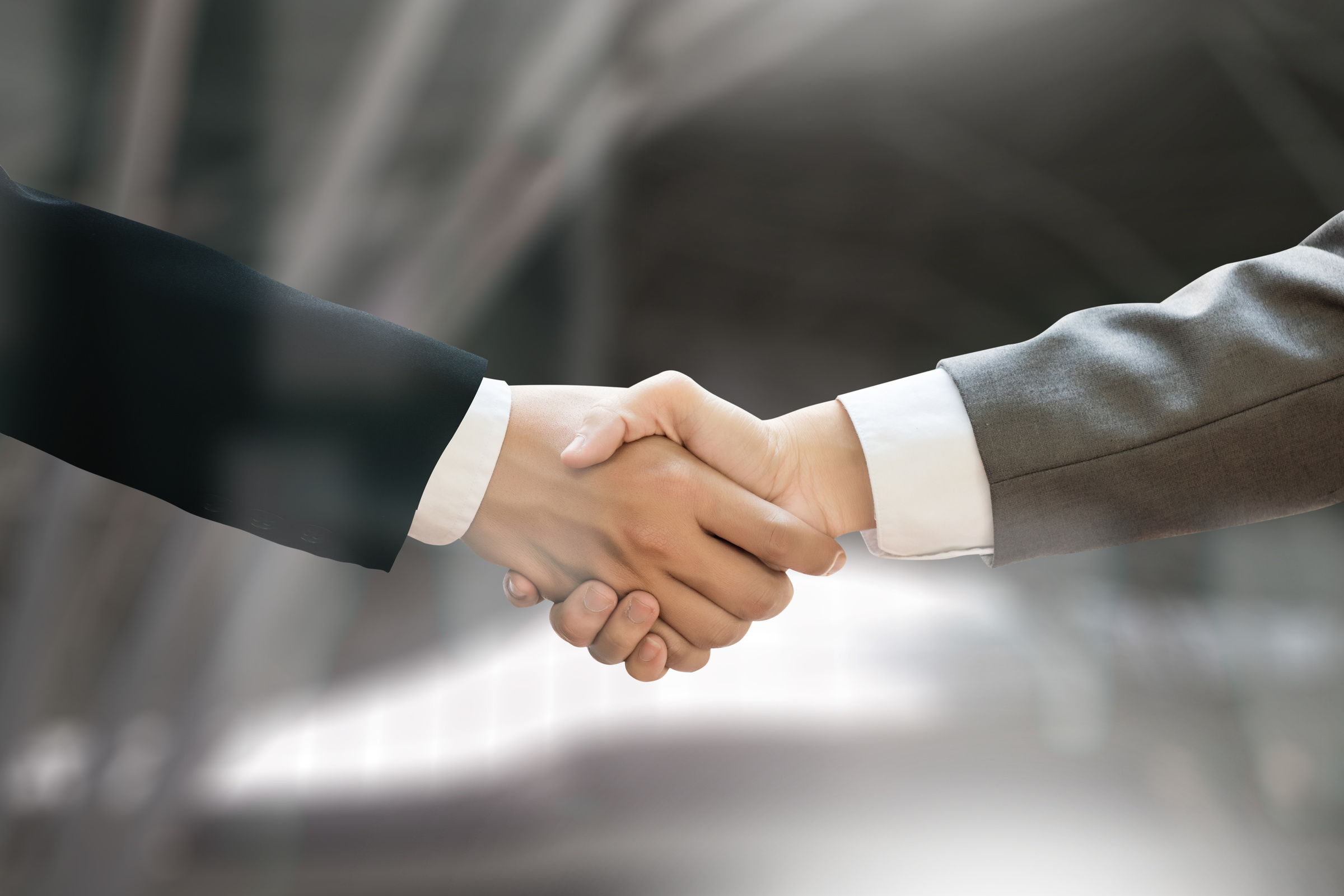 M&A (MERGERS AND ACQUISITIONS) , Businessman handshake working at office M&A